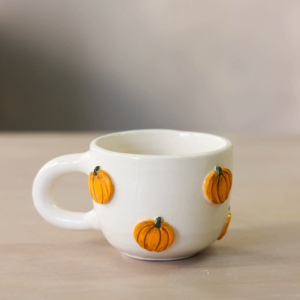 Pumpkins mug by Dirt Person